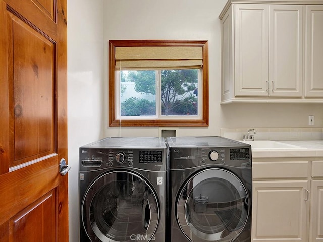 508 Lantern Crest Dr, Redlands, CA 92373 - laundry room featuring separate washer and dryer, a sink, and cabinet space