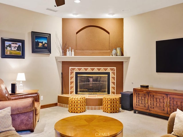 508 Lantern Crest Dr, Redlands, CA 92373 - living area with carpet floors, recessed lighting, a tile fireplace, and visible vents