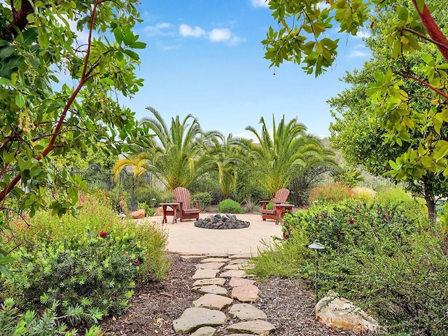 508 Lantern Crest Dr, Redlands, CA 92373 - view of yard featuring an outdoor fire pit and a patio