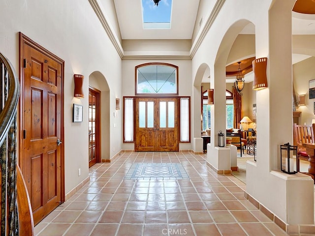 508 Lantern Crest Dr, Redlands, CA 92373 - foyer with baseboards, a high ceiling, and light tile patterned flooring