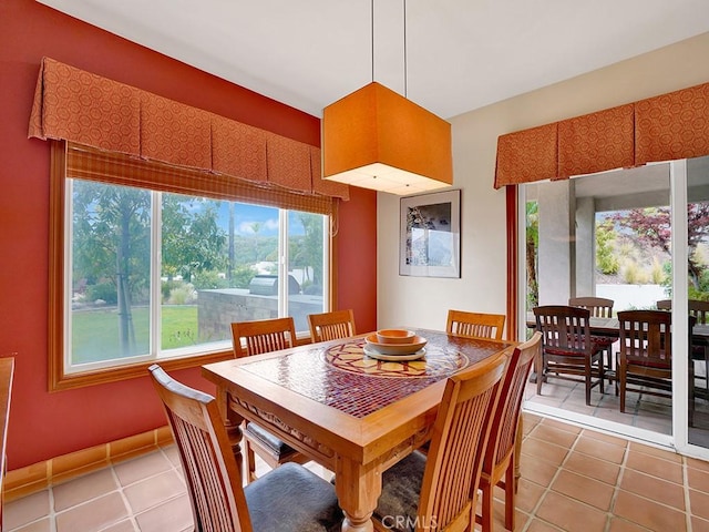 508 Lantern Crest Dr, Redlands, CA 92373 - dining space featuring light tile patterned floors and a healthy amount of sunlight