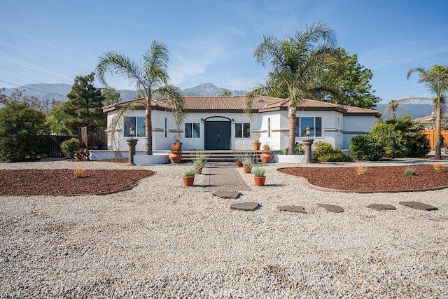 10114 Wilson Ave, Rancho Cucamonga, CA 91737 - view of front of property featuring a mountain view, stucco siding, and a tile roof