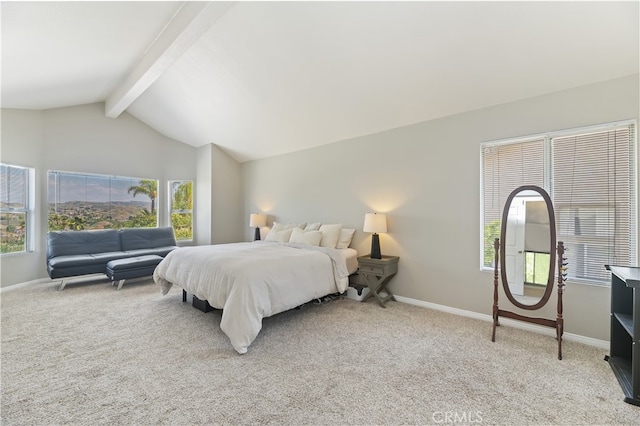 bedroom featuring lofted ceiling with beams, light carpet, and multiple windows