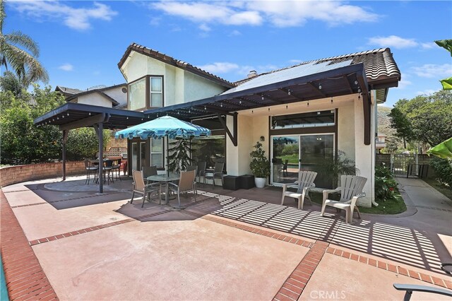 view of patio / terrace with fence and outdoor dining space