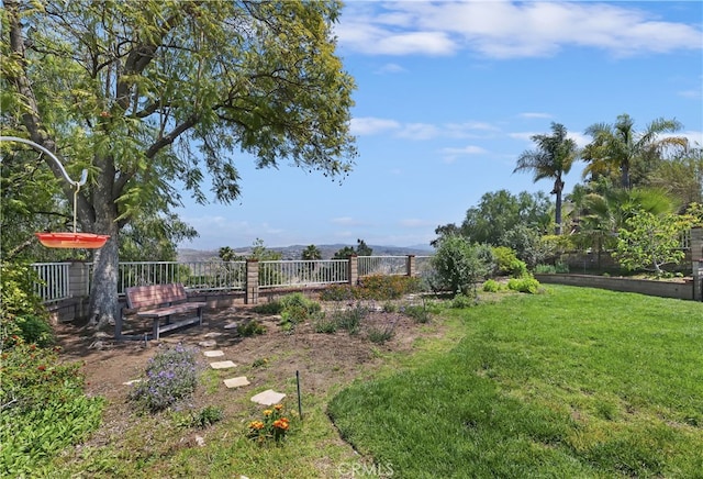 view of yard with fence