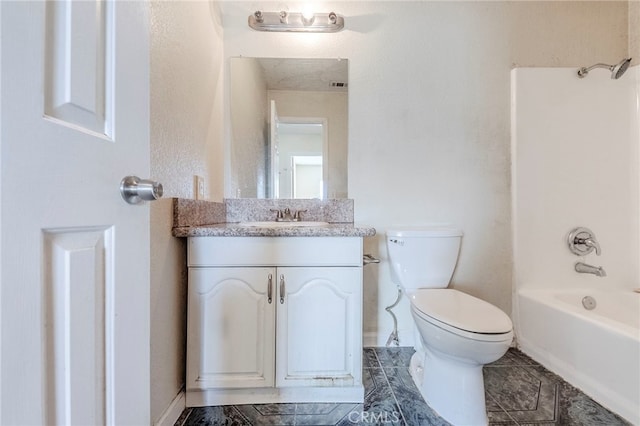 full bath with vanity, shower / bathing tub combination, tile patterned flooring, and toilet