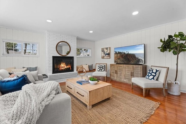 8212 Reading Ave, Los Angeles, CA 90045 - living room featuring light wood-type flooring, a brick fireplace, and recessed lighting