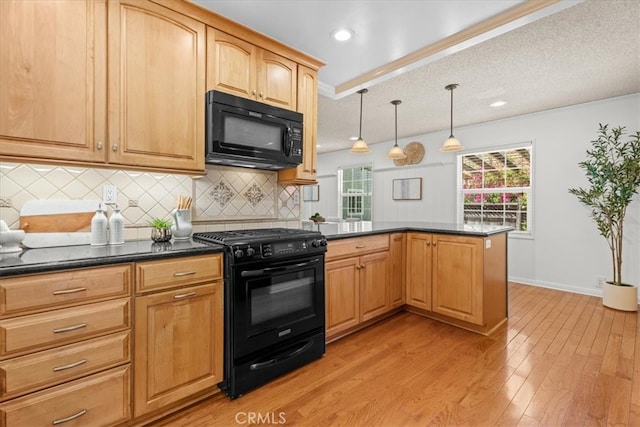 8212 Reading Ave, Los Angeles, CA 90045 - kitchen with black appliances, light wood-type flooring, backsplash, a peninsula, and recessed lighting