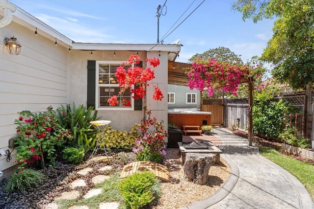8212 Reading Ave, Los Angeles, CA 90045 - view of yard featuring a hot tub, fence, and a patio area