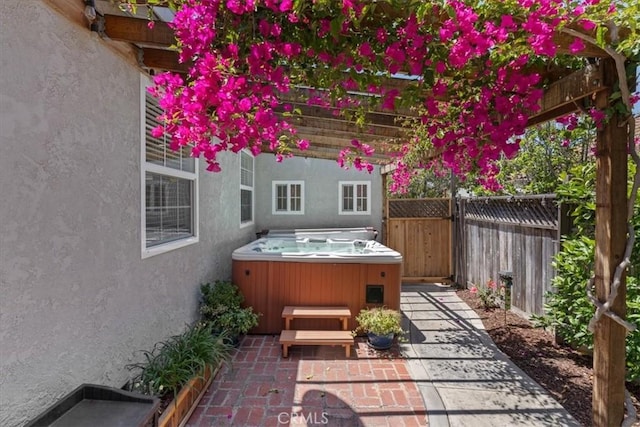 8212 Reading Ave, Los Angeles, CA 90045 - view of patio featuring a hot tub and fence