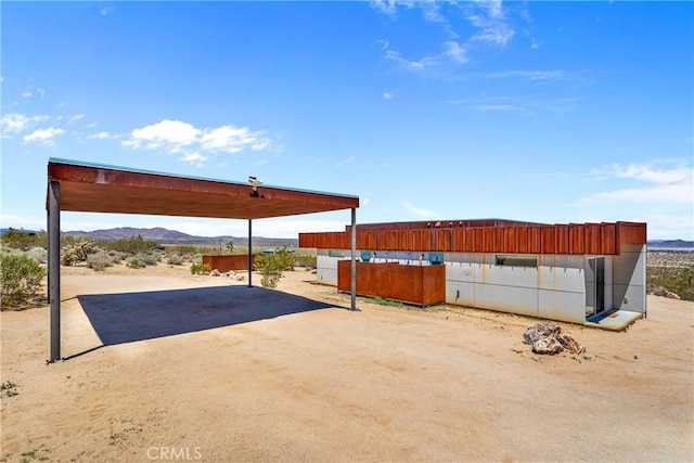 64172 Hollinger Rd, Joshua Tree, CA 92252 - view of patio featuring a mountain view