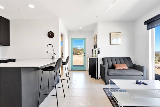 64172 Hollinger Rd, Joshua Tree, CA 92252 - living room featuring recessed lighting and light tile patterned floors