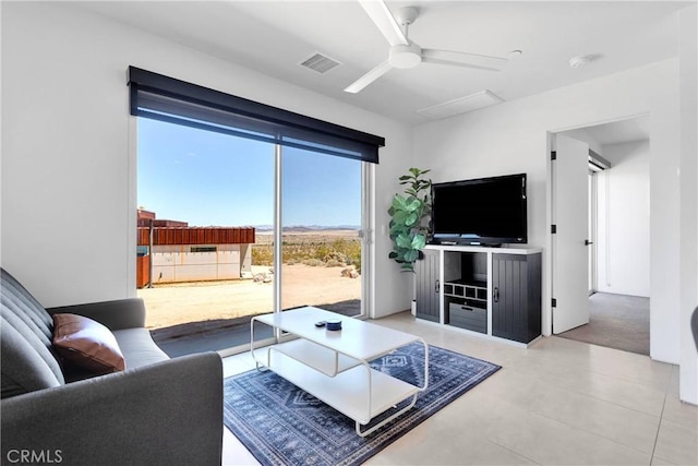 64172 Hollinger Rd, Joshua Tree, CA 92252 - living area with ceiling fan and tile patterned flooring