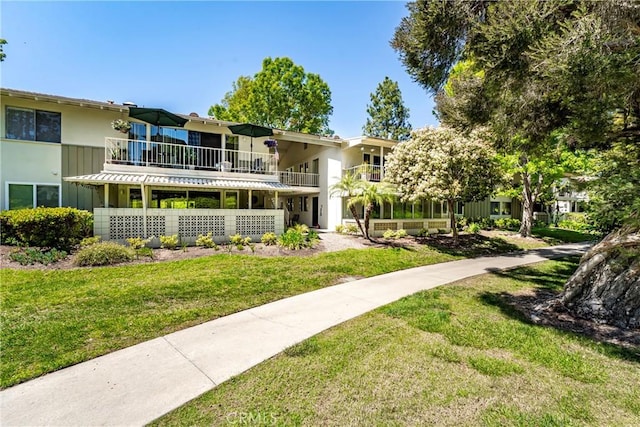 76 Calle Aragon Unit Q, Laguna Woods, CA 92637 - view of home's community featuring a lawn
