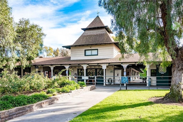 76 Calle Aragon Unit Q, Laguna Woods, CA 92637 - view of home's community with a lawn
