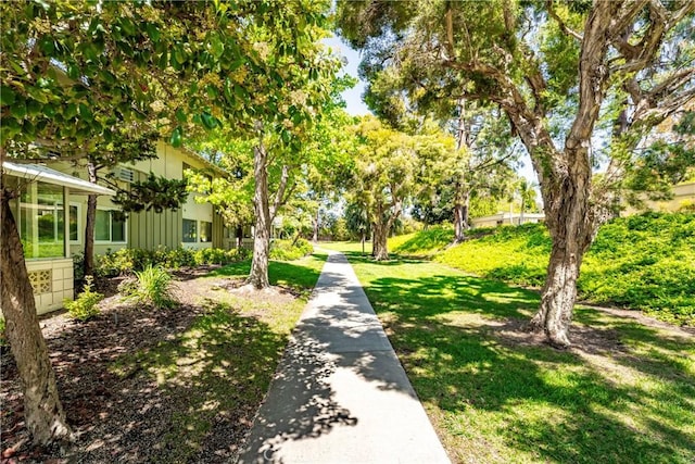 76 Calle Aragon Unit Q, Laguna Woods, CA 92637 - surrounding community with a yard