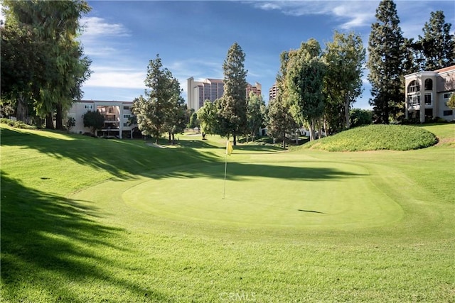 76 Calle Aragon Unit Q, Laguna Woods, CA 92637 - view of community featuring view of golf course and a lawn
