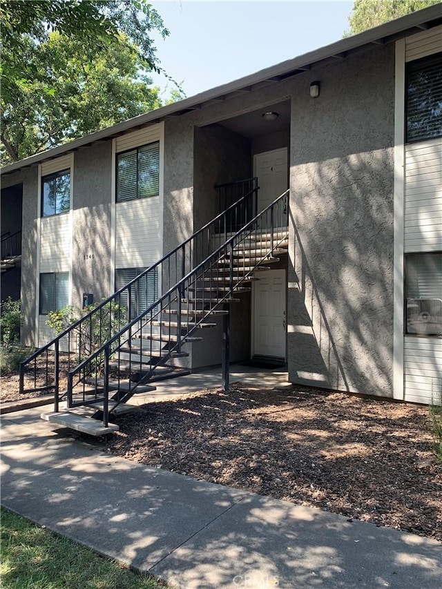 exterior space featuring stucco siding