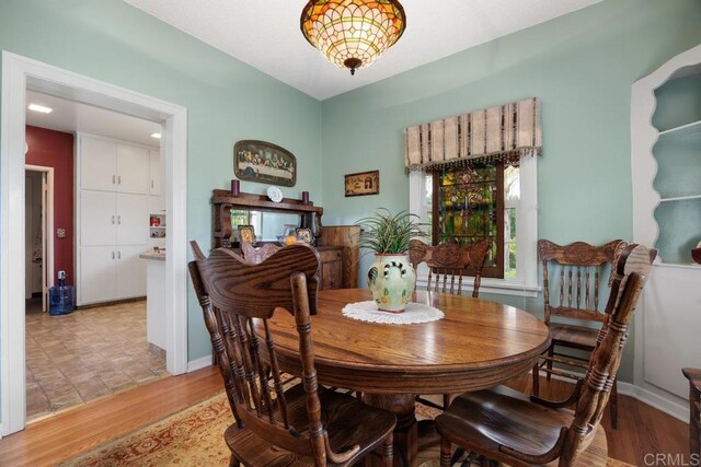1704 Winterwarm Dr, Fallbrook, CA 92028 - dining space with light wood-type flooring and baseboards