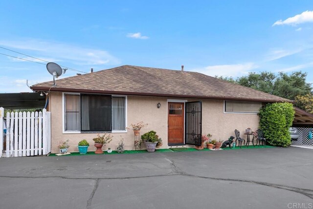 1704 Winterwarm Dr, Fallbrook, CA 92028 - bungalow-style house with stucco siding and roof with shingles
