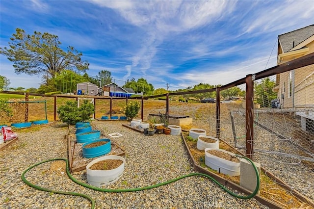 30840 Badger Ct, Coarsegold, CA 93614 - view of yard featuring fence and a vegetable garden
