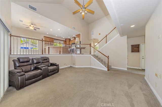 30840 Badger Ct, Coarsegold, CA 93614 - living room featuring stairs, visible vents, vaulted ceiling, carpet flooring, and a ceiling fan