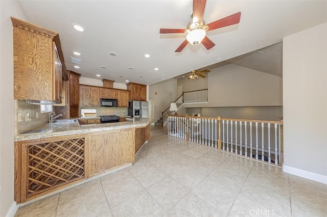 30840 Badger Ct, Coarsegold, CA 93614 - kitchen with a ceiling fan, a sink, light tile patterned floors, black appliances, and recessed lighting