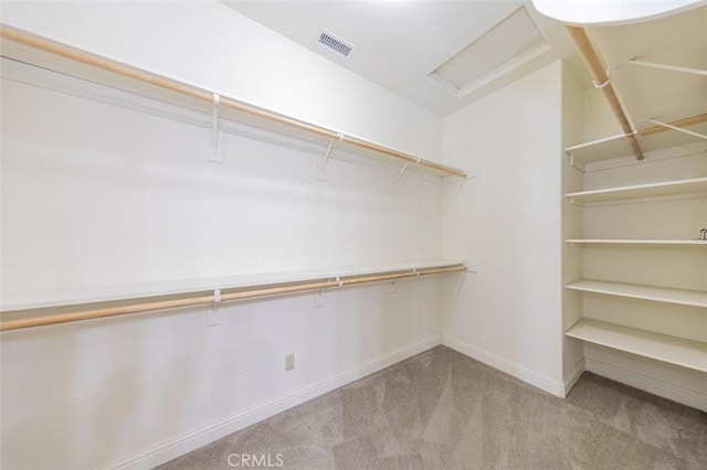 30840 Badger Ct, Coarsegold, CA 93614 - walk in closet featuring carpet floors, attic access, and visible vents