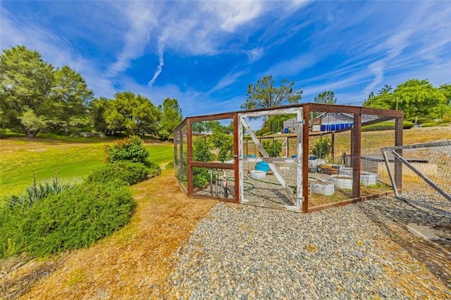 30840 Badger Ct, Coarsegold, CA 93614 - view of playground with a yard and fence