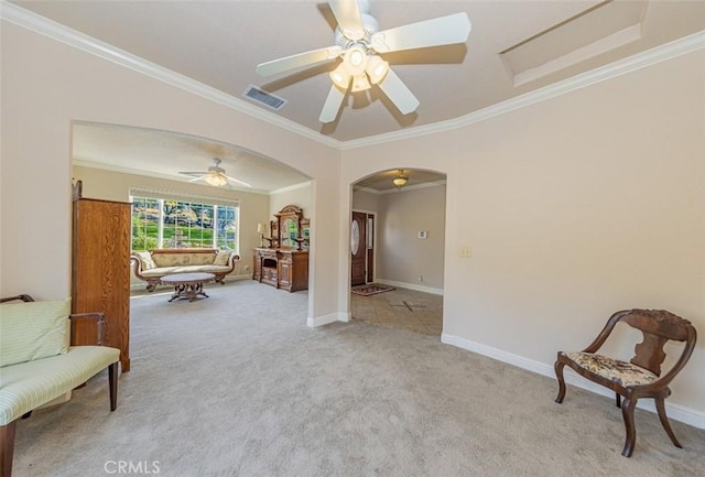 30840 Badger Ct, Coarsegold, CA 93614 - sitting room featuring arched walkways, ornamental molding, visible vents, and light colored carpet