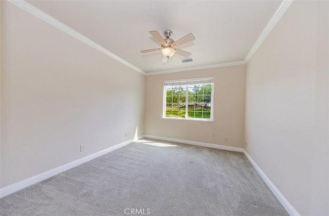 30840 Badger Ct, Coarsegold, CA 93614 - empty room with a ceiling fan, visible vents, crown molding, carpet floors, and baseboards
