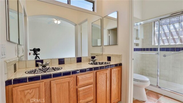 9630 El Mirador Blvd, Desert Hot Springs, CA 92240 - full bathroom with toilet, a healthy amount of sunlight, and a sink