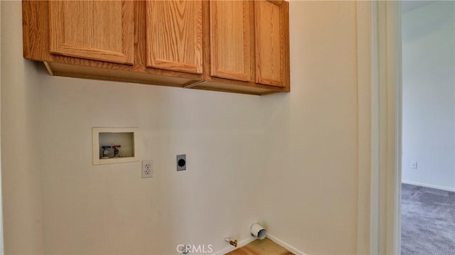9630 El Mirador Blvd, Desert Hot Springs, CA 92240 - laundry room featuring baseboards, cabinet space, hookup for an electric dryer, washer hookup, and hookup for a gas dryer