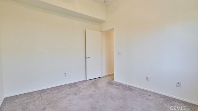 9630 El Mirador Blvd, Desert Hot Springs, CA 92240 - unfurnished room featuring baseboards and light carpet