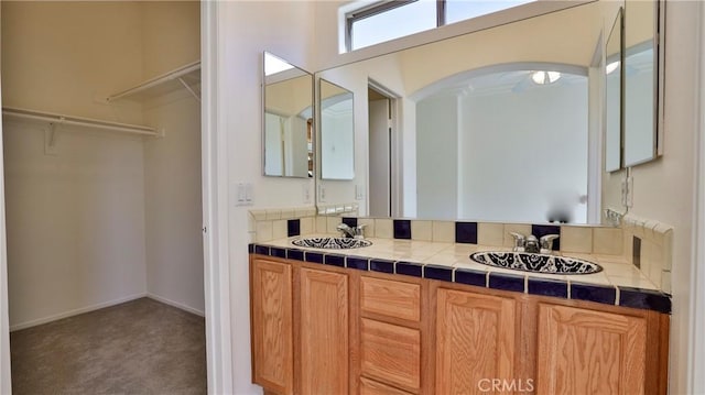 9630 El Mirador Blvd, Desert Hot Springs, CA 92240 - full bathroom with double vanity, a spacious closet, and a sink