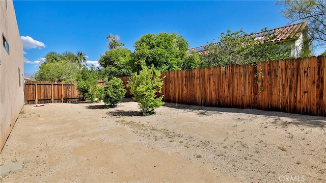 9630 El Mirador Blvd, Desert Hot Springs, CA 92240 - view of yard featuring a fenced backyard