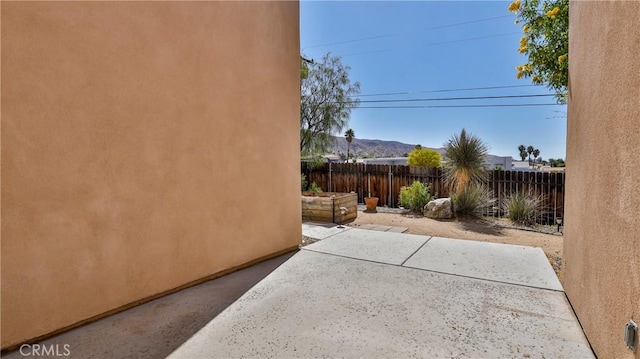 9630 El Mirador Blvd, Desert Hot Springs, CA 92240 - view of patio with fence and a mountain view