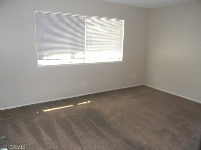 6045 Promontory Ln, Riverside, CA 92506 - carpeted spare room with baseboards