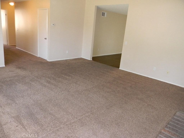 6045 Promontory Ln, Riverside, CA 92506 - spare room with carpet flooring, baseboards, and visible vents