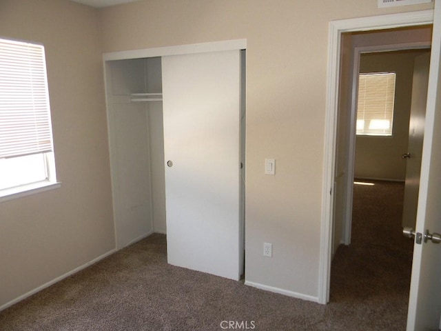 6045 Promontory Ln, Riverside, CA 92506 - unfurnished bedroom featuring visible vents, carpet, and a closet