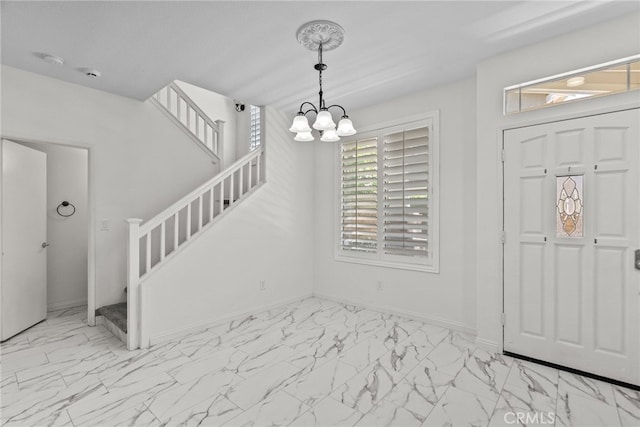 27017 Big Rpds Unit 37, Valencia, CA 91354 - entrance foyer featuring marble finish flooring, a chandelier, and stairs