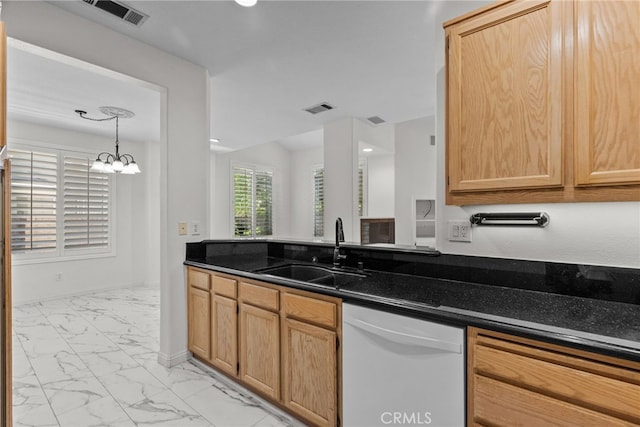 27017 Big Rpds Unit 37, Valencia, CA 91354 - kitchen featuring dishwasher, light marble finish flooring, dark countertops, and a chandelier