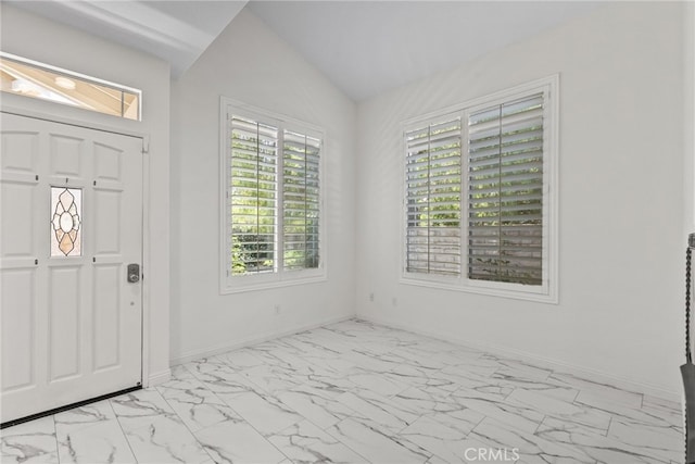 27017 Big Rpds Unit 37, Valencia, CA 91354 - foyer featuring light marble finish flooring and vaulted ceiling