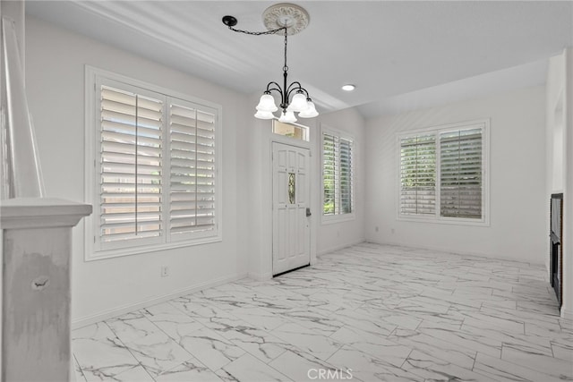 27017 Big Rpds Unit 37, Valencia, CA 91354 - entrance foyer with marble finish flooring, a chandelier, and recessed lighting