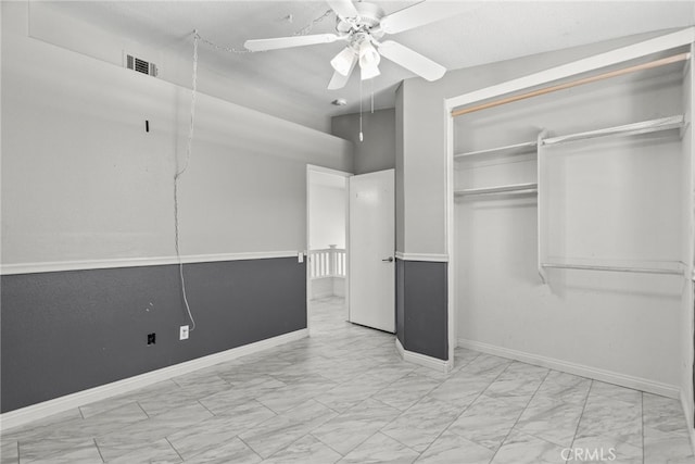 27017 Big Rpds Unit 37, Valencia, CA 91354 - unfurnished bedroom with marble finish floors, a closet, and a ceiling fan