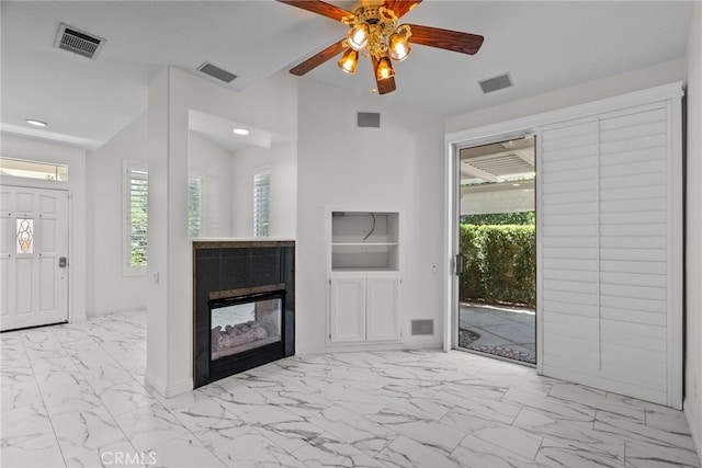 27017 Big Rpds Unit 37, Valencia, CA 91354 - unfurnished living room with marble look tiles, recessed lighting, a multi sided fireplace, and a ceiling fan