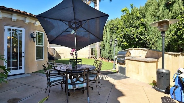 8531 10th St, Downey, CA 90241 - view of patio / terrace featuring outdoor dining space and an outdoor kitchen