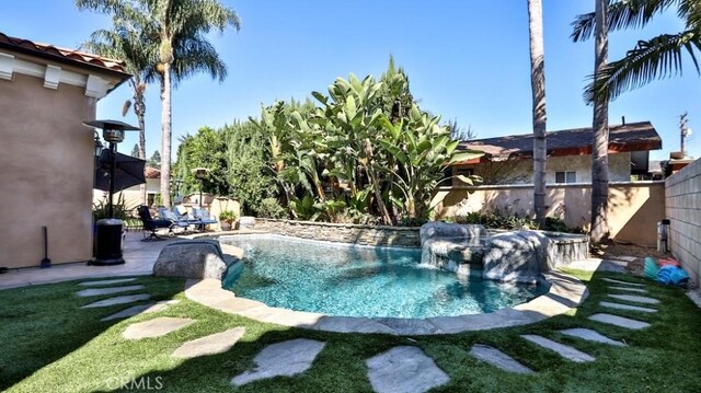 8531 10th St, Downey, CA 90241 - view of swimming pool with a fenced backyard