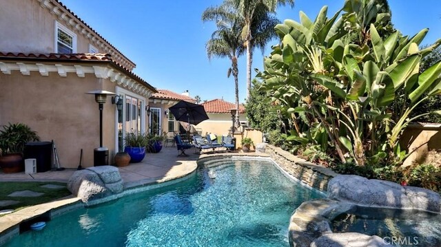 8531 10th St, Downey, CA 90241 - view of swimming pool with a patio area and a pool with connected hot tub