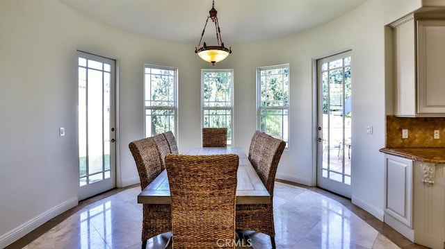 8531 10th St, Downey, CA 90241 - dining room featuring baseboards